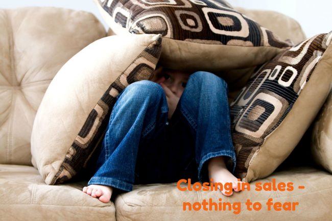 closing – nothing to fear child hiding under cushions