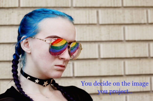 Girl with blue hair and mirrored shades